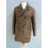 A dark brown sheepskin coat