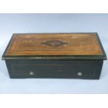 A 19th century inlaid musical box playing a selection of six arias (the comb has some teeth missing)