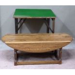 A mid 20th century mahogany fold over card table of rectangular outline together with a oak low drop