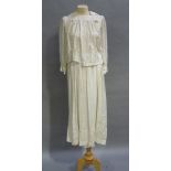 An Edwardian ivory shantung silk two piece dress having a square neckline with embroidered bodice