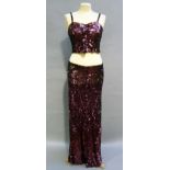 A French two piece sequined evening dress, the sequinned bodice with shoulder straps attaching to