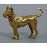 A cast bronze model of a dog, realistically modelled, 5cm long, stamped Geschutz