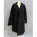 A Persian lamb coat with shawl collar