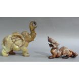 An onyx figure of an elephant its trunk raised; together with a hardstone carving of a dragon