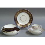 A Stevenson Hancock Derby porcelain trio comprising shallow teacup, saucer and plate each