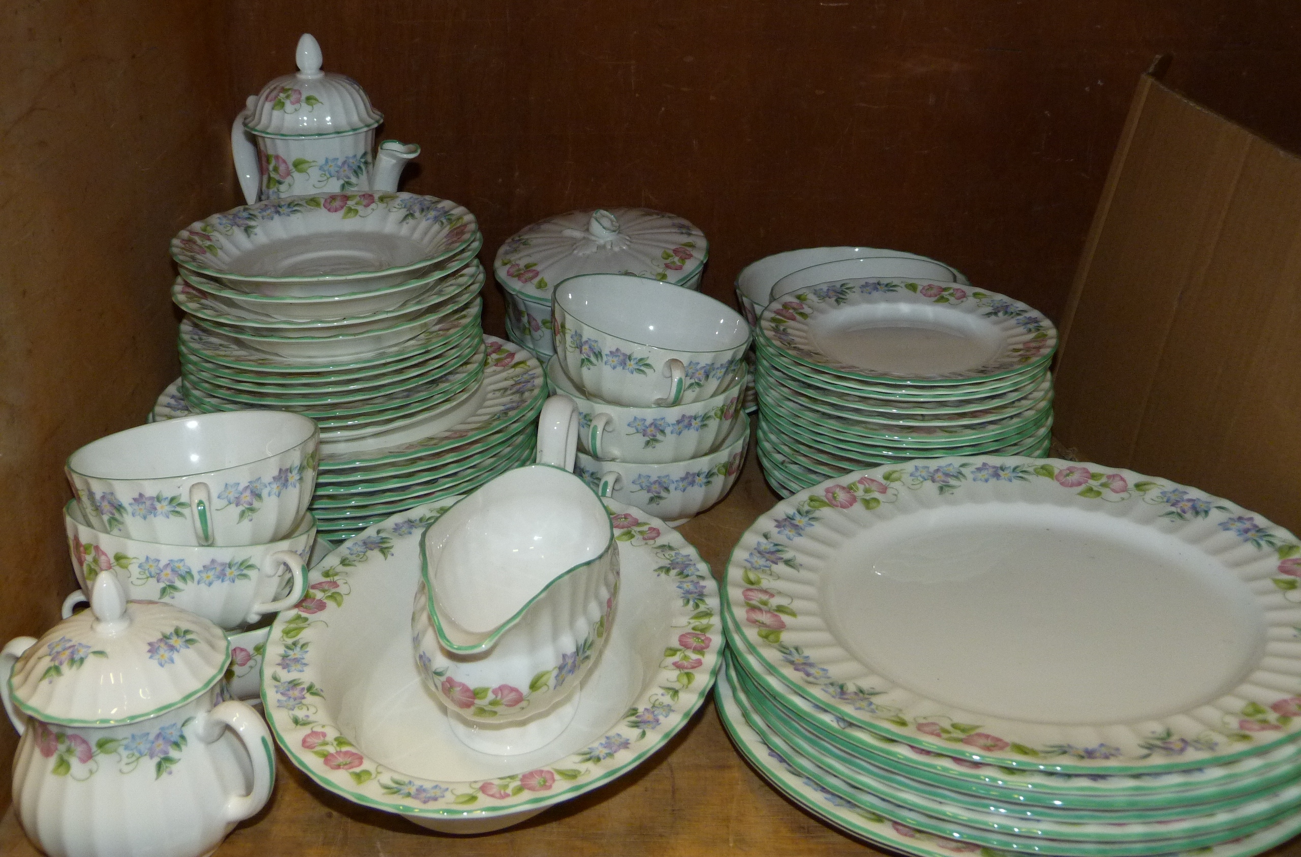 A Royal Worcester English garden table ware, approximately 61 pieces