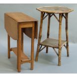 An Edwardian oak Sutherland table with serpentine shaped drop leaves on moulded square legs joined