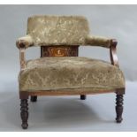 A Victorian inlaid tub chair