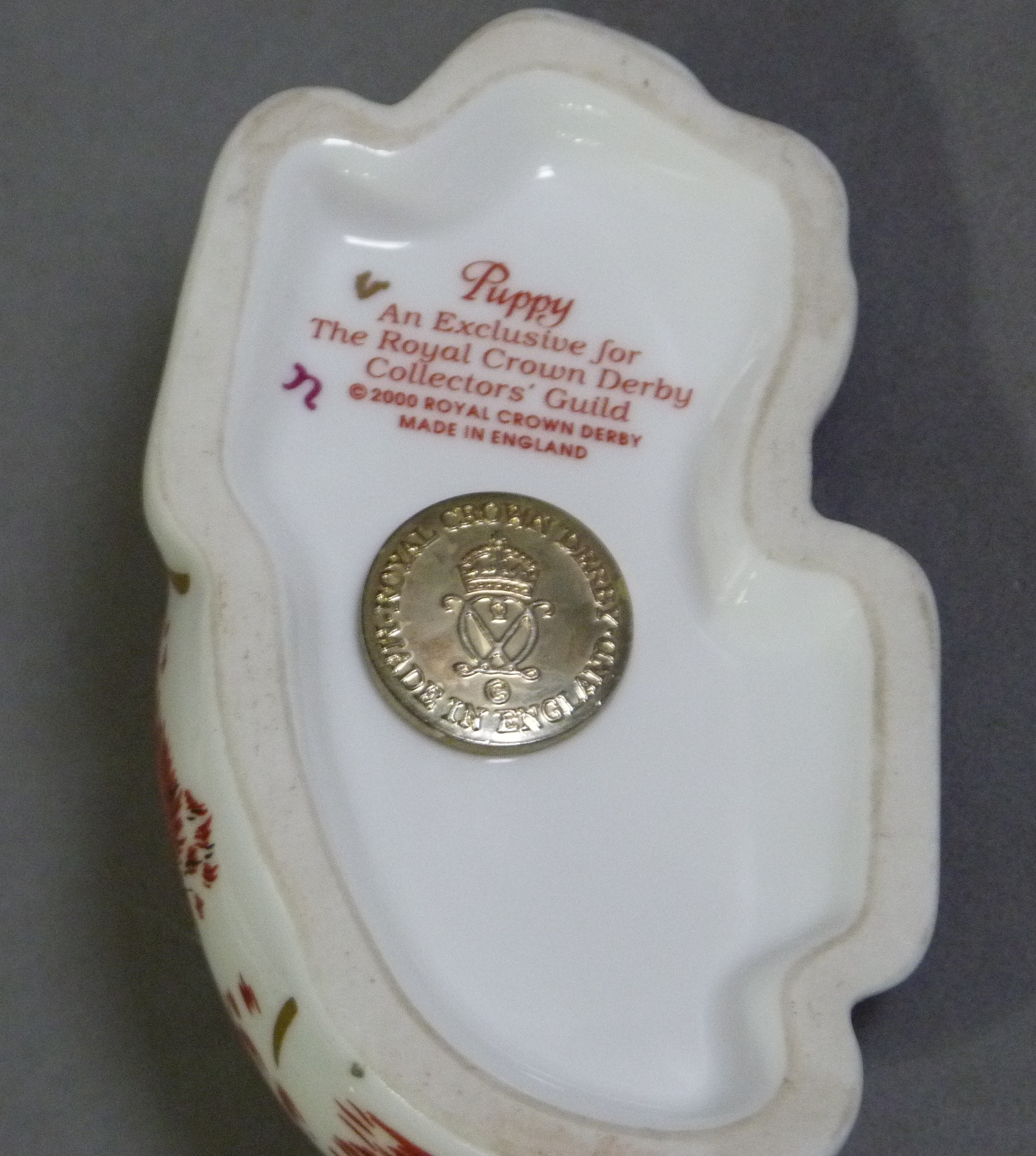 A Royal Doulton paperweight puppy exclusive Royal Crown Derby collectors guild with gilt button - Image 2 of 2