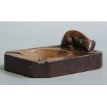 A Thompson of Kilburn 'Mouseman' ashtray with canted corners carved in relief with a mouse
