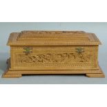 An Indian carved camphor wood casket which previously held a farewell address to Mr D R Robinson