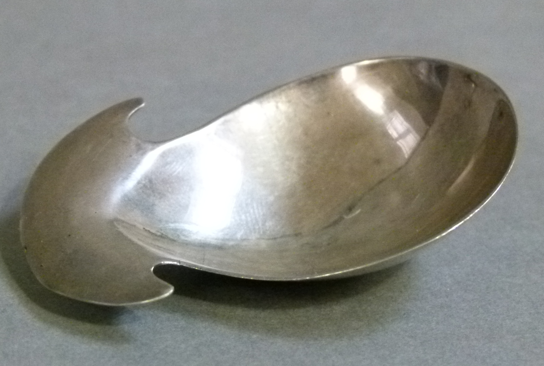 A George III silver caddy spoon of fig shape with crescent handle, 6cm wide by Hester Bateman or - Image 2 of 3