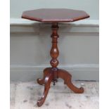 A Victorian octagonal occasional table on baluster column on tripod base