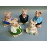 A set of Wade Natwest piggy banks