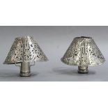 A pair of Gorham pierced white metal candle shades as candle fittings