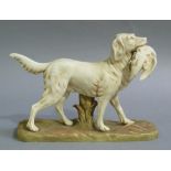 A Royal Dux Bohemia figure of a gundog with game, on naturalistic base, model number 1193