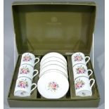 Royal Worcester china boxed coffee set of six coffee cans and saucers, floral decoration with gilt
