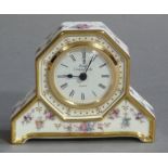 A Royal Crown Derby Antionette pattern mantel clock, the gilt metal mounted face within an octagonal