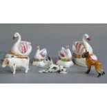 A pair of Staffordshire swan inkwells, polychrome enameled with provision for two quills, 8.5cm