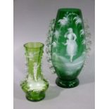 A Victorian Mary Gregory style green glass baluster vase with crimped clear glass handles, 27cm