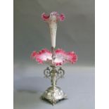 A Victorian silver plated and glass epergne with detachable pink and white cased trumpet