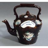 A 19th century Measham bargeware tea kettle and cover, relief decorated with vases, flowers and