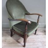 A polished beech framed armchair c.1930 having upholstered back and seat on turned and square