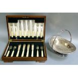 A set of eight ivorine handled silver plated fish knives and forks, cased, together with a silver