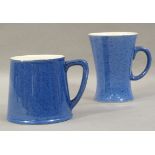 Two Moorcroft Powder Blue mugs, circa 1920s, 12cm & 9.5cm (2)