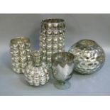 Five silvered glass vases or tea light holders, various sizes