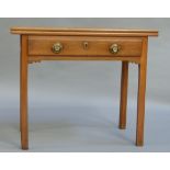 A George IV oak tea table, the rectangular top above a frieze fitted with one long drawer, square