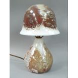 Selkirk studio glass table lamp and bell shaped shade in brown, grey and off-white, on a bottle