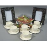 A pair of wooden frames, a decorative dish, boxed and a small quantity of cream ware pottery