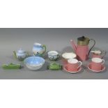 A Royal Worcester coffee service for two, the pink tapered cylindrical bodies with silver plated