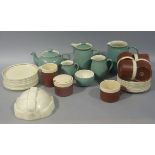 A Denby green pottery teapot, hot water jug, three cream jugs, sugar and a small quantity of Hornsea