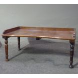 A mahogany folding bed table with three quarter gallery and ratchet centre section, 60 cm wide