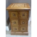 A reproduction small chest of six deep drawers, parquetry inlaid, 48cm wide, modern