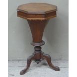 A Victorian mahogany octagonal trumpet shaped work table on acanthus carved cabriole legs, 72cm high