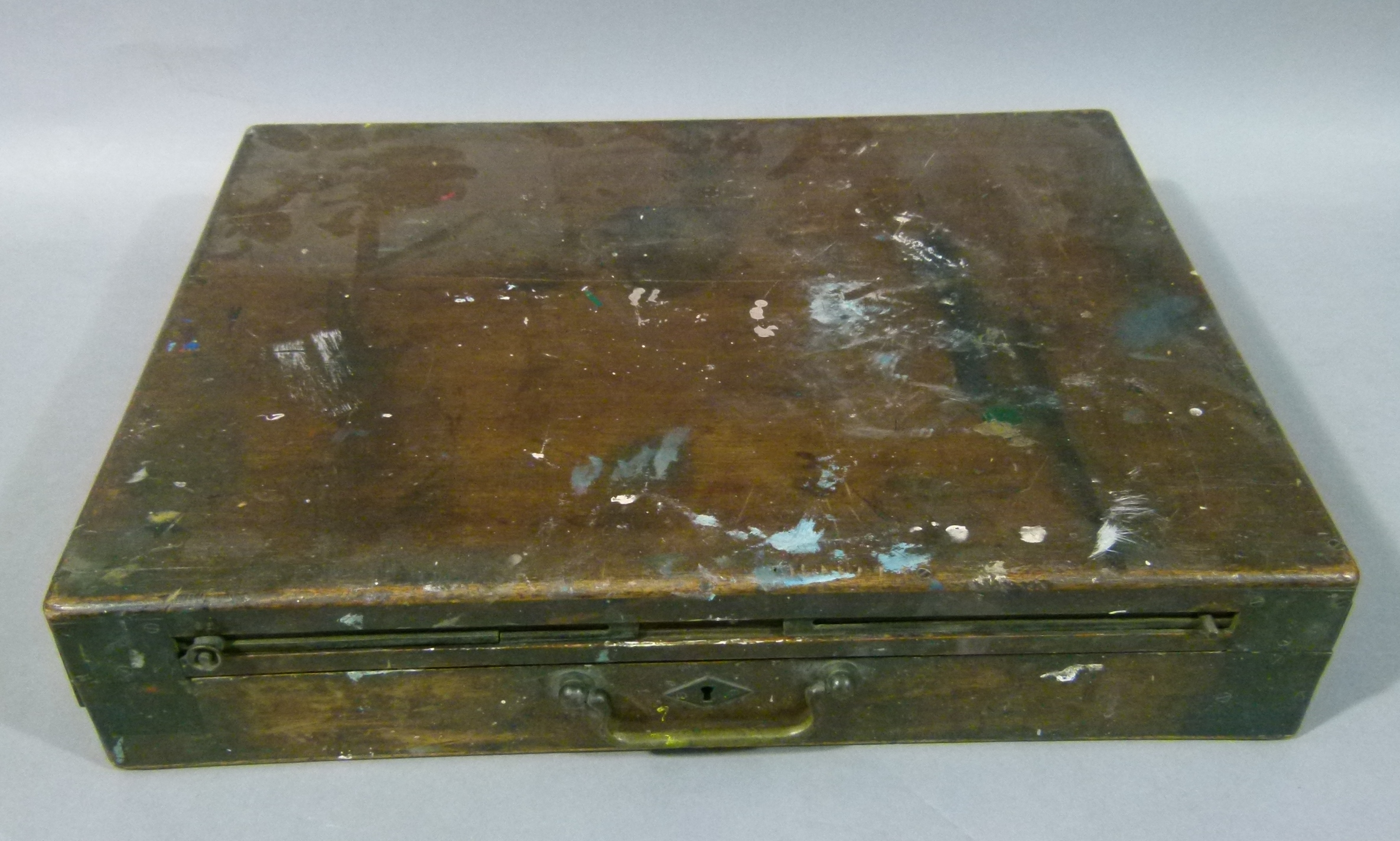 A Victorian mahogany artist's box with sliding sections to front, brass handle, 45cm wide