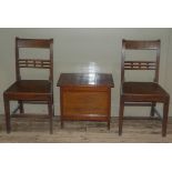 A pair of 19th century country chairs with bar and ball tie rails and full seats on square tapered