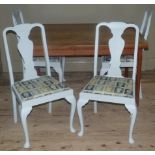 A set of four grey painted chairs with postage stamp fabric upholstered seats; together with a