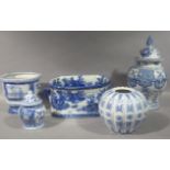 A quantity of reproduction Chinese blue and white vases, planters etc
