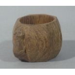 Robert Thompson of Kilburn (Mouseman) an octagonal napkin ring with signature mouse, 5cm high