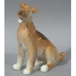 A Russian pottery model of an Airedale terrier, 7cm high