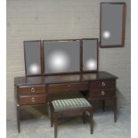 A Stag Meridew Minstrel range dressing table, stool and wall mirror, dressing table 154cm wide (3)