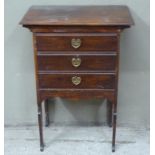 An Art Nouveau mahogany stained music cabinet fitted with three drawers above shaped apron and