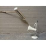 A cream anglepoise lamp, together with another bench mounted lamp