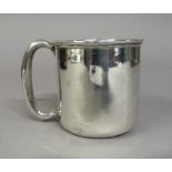 A silver sterling standard christening mug of plain cylindrical form with loop handle, 6cm high,