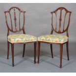 A pair of Edward VII mahogany single chairs by Marsh Jones & Cribb No.81400, each having an open