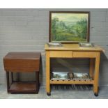 A mahogany drop leaf trolley with under tier, a beech kitchen trolley with chopping board, drawers